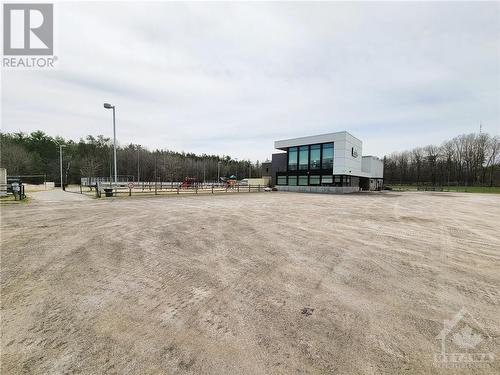 Short walk to Community Centre with soccer fields, outdoor rink, skateboard park, ball diamond, play ground, gym, library, hall. - 215 Fireside Drive, Constance Bay, ON - Outdoor