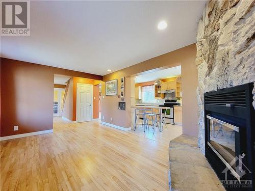 215 Fireside Drive, Constance Bay, ON - Indoor Photo Showing Other Room With Fireplace