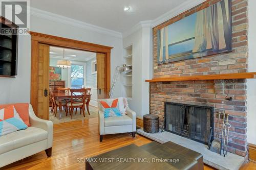 110 Marion St, Toronto, ON - Indoor Photo Showing Living Room With Fireplace