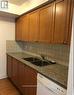 1412 - 310 Burnhamthorpe Road W, Mississauga, ON  - Indoor Photo Showing Kitchen With Double Sink 