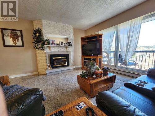 308 1654 10Th Avenue, Prince George, BC - Indoor Photo Showing Living Room With Fireplace