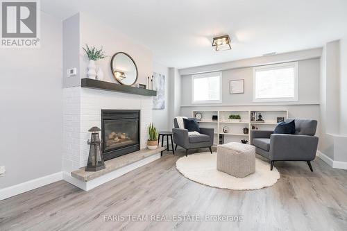 562 Simcoe Street, Collingwood, ON - Indoor Photo Showing Living Room With Fireplace