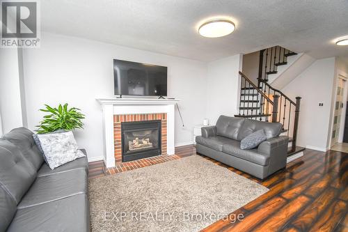 30 Aikens Crescent, Barrie, ON - Indoor Photo Showing Living Room With Fireplace