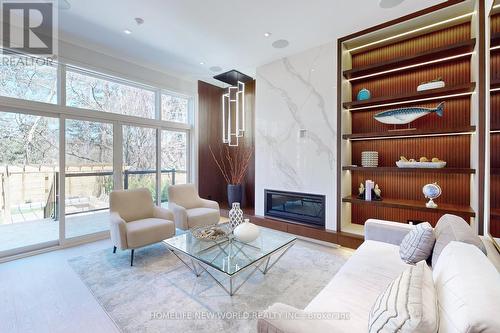 168 Glenvale Blvd, Toronto, ON - Indoor Photo Showing Living Room With Fireplace