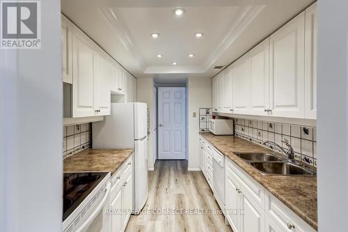#1908 -75 Wynford Heights Cres, Toronto, ON - Indoor Photo Showing Kitchen With Double Sink