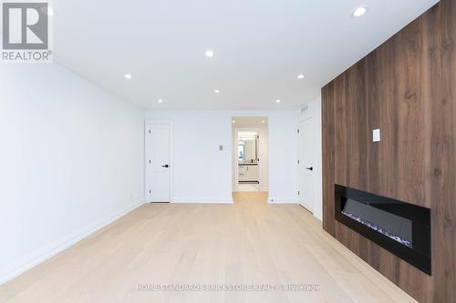 #805 -61 St Clair Ave W, Toronto, ON - Indoor Photo Showing Other Room With Fireplace