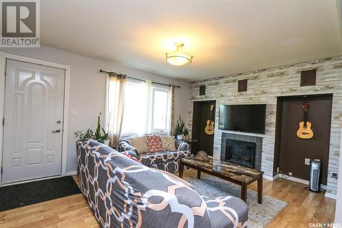 38 Redwood Drive, Yorkton, SK - Indoor Photo Showing Living Room With Fireplace