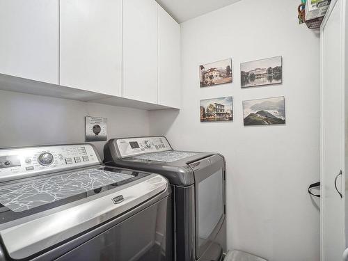 Laundry room - 603-2160 Av. Terry-Fox, Laval (Chomedey), QC - Indoor Photo Showing Laundry Room