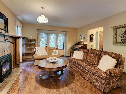 1310 Readings Dr, North Saanich, BC - Indoor Photo Showing Living Room With Fireplace