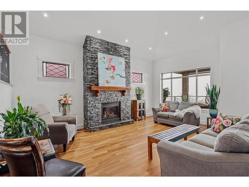 750 Marin Crescent, Kelowna, BC - Indoor Photo Showing Living Room With Fireplace