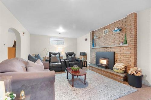 122 Glennie Avenue, Hamilton, ON - Indoor Photo Showing Living Room With Fireplace