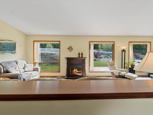 6305 Ranchero Drive, Salmon Arm, BC - Indoor Photo Showing Living Room With Fireplace