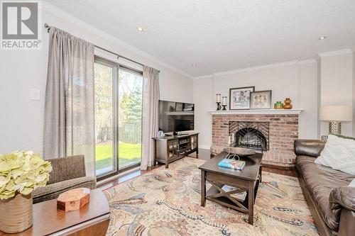 573 Barons Crt, Burlington, ON - Indoor Photo Showing Living Room With Fireplace
