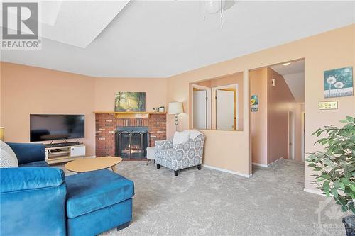20 Shehyn Lane Unit#C, Ottawa, ON - Indoor Photo Showing Living Room With Fireplace