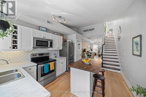 #303 -79 King St W, Cobourg, ON - Indoor Photo Showing Kitchen With Double Sink