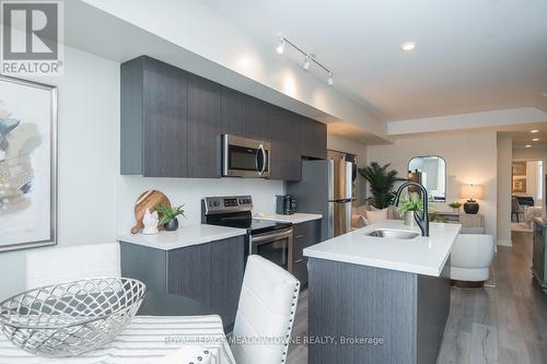#204 -3058 Sixth Line, Oakville, ON - Indoor Photo Showing Kitchen With Stainless Steel Kitchen