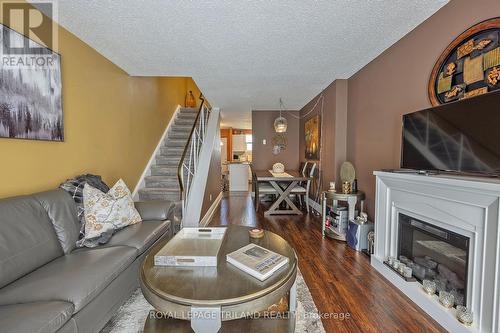 #75 -1919 Trafalgar St, London, ON - Indoor Photo Showing Living Room With Fireplace