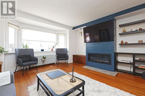 228 Glenwood Crescent, Toronto, ON - Indoor Photo Showing Living Room With Fireplace