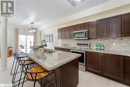 13 Isaac Devins Boulevard, Toronto, ON - Indoor Photo Showing Kitchen With Double Sink