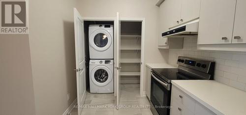 #207 -32 Wellington St E, Aurora, ON - Indoor Photo Showing Laundry Room