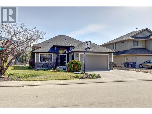 9823 Kinross Place, Coldstream, BC - Outdoor With Facade