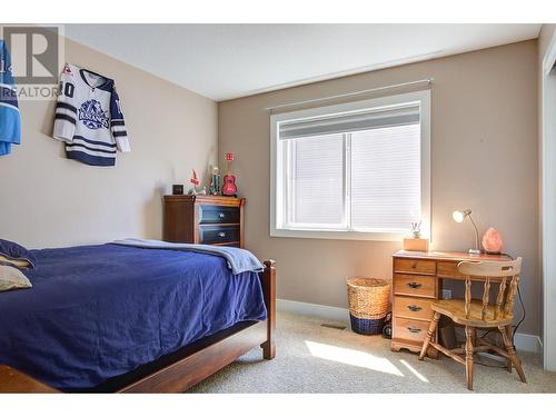 9823 Kinross Place, Coldstream, BC - Indoor Photo Showing Bedroom