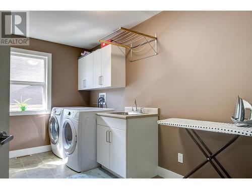 9823 Kinross Place, Coldstream, BC - Indoor Photo Showing Laundry Room