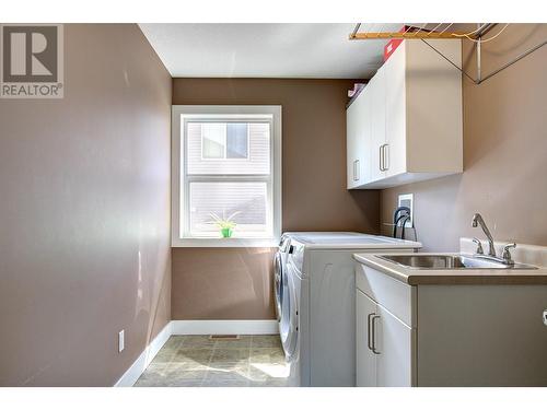 9823 Kinross Place, Coldstream, BC - Indoor Photo Showing Laundry Room