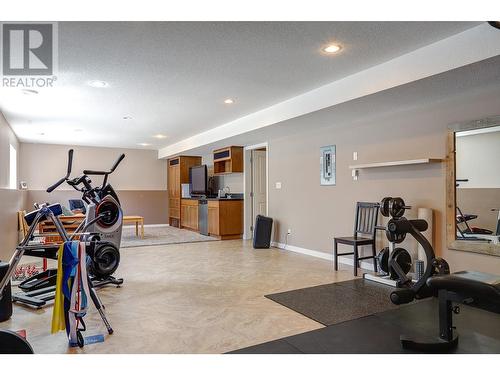 9823 Kinross Place, Coldstream, BC - Indoor Photo Showing Gym Room