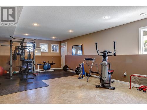 9823 Kinross Place, Coldstream, BC - Indoor Photo Showing Gym Room