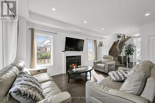 235 Stone Church Road E, Hamilton, ON - Indoor Photo Showing Living Room With Fireplace