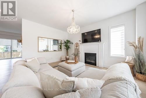 #2 -121 Fiddlers Green Rd, Hamilton, ON - Indoor Photo Showing Living Room With Fireplace