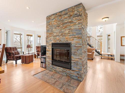 Overall view - 32 Ch. Jack-Galvin, Bolton-Est, QC - Indoor Photo Showing Living Room With Fireplace