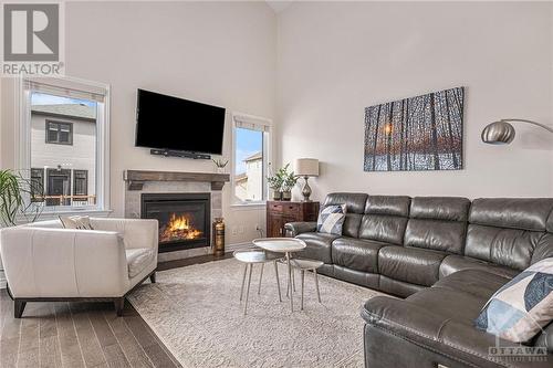 Great room - 179 Station Trail, Russell, ON - Indoor Photo Showing Living Room With Fireplace