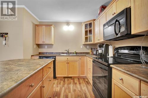 1004 715 Hart Road, Saskatoon, SK - Indoor Photo Showing Kitchen With Double Sink