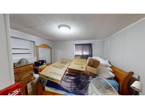 411 9Th Avenue S, Cranbrook, BC - Indoor Photo Showing Bedroom