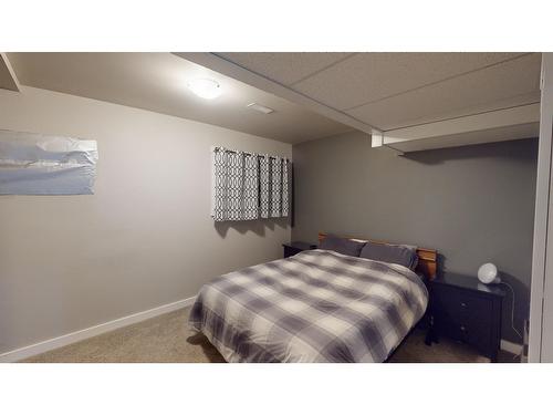 411 9Th Avenue S, Cranbrook, BC - Indoor Photo Showing Bedroom