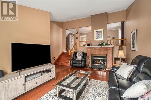 1497 Bourcier Drive, Ottawa, ON - Indoor Photo Showing Living Room With Fireplace