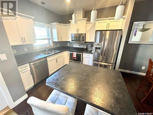 104 Atton Crescent, Saskatoon, SK - Indoor Photo Showing Kitchen With Stainless Steel Kitchen With Double Sink