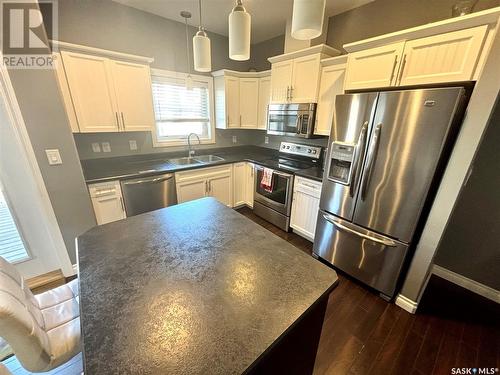 104 Atton Crescent, Saskatoon, SK - Indoor Photo Showing Kitchen With Stainless Steel Kitchen With Double Sink