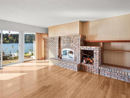 1913 Kaltasin Rd, Sooke, BC - Indoor Photo Showing Living Room With Fireplace