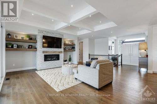 38 Des Spirees Place, Clarence-Rockland, ON - Indoor Photo Showing Living Room With Fireplace