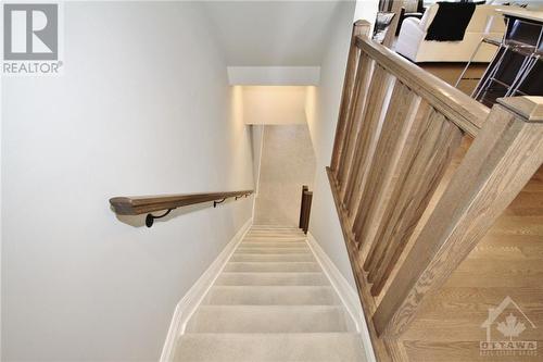 Stairs to Fully Finished Basement with Full Bathroom - 338 Kilspindie Ridge, Ottawa, ON - Indoor Photo Showing Other Room