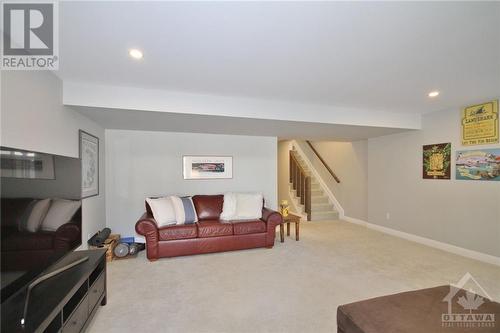 Fully Finished Walk-Out Basement with Full Bathroom - 338 Kilspindie Ridge, Ottawa, ON - Indoor Photo Showing Living Room