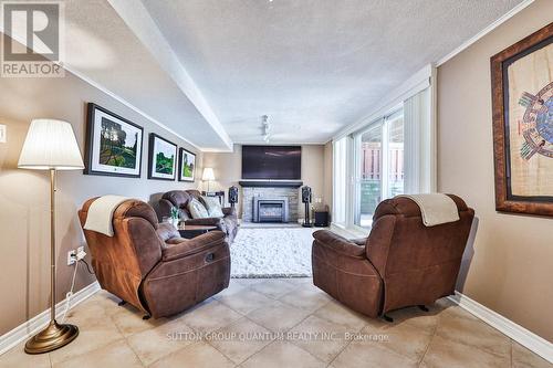 57 Decarie Circ, Toronto, ON - Indoor Photo Showing Other Room With Fireplace