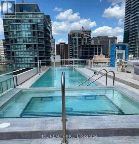 #203 -161 Roehampton Ave, Toronto, ON - Outdoor With In Ground Pool