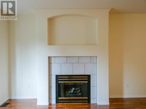7 410 Pinchbeck Street, Quesnel, BC - Indoor Photo Showing Living Room With Fireplace