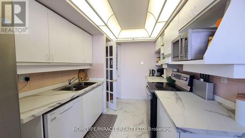#1810 -24 Hanover Rd, Brampton, ON - Indoor Photo Showing Kitchen With Double Sink