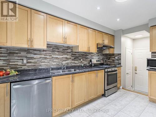 725 Ambroise Cres, Milton, ON - Indoor Photo Showing Kitchen With Stainless Steel Kitchen With Double Sink