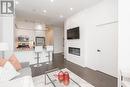 #311 -360 Square One Dr E, Mississauga, ON  - Indoor Photo Showing Living Room With Fireplace 